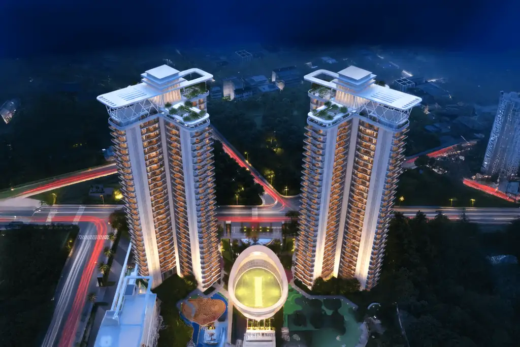 Aerial night view of VVIP Addresses towers and clubhouse in Sector 12, Greater Noida West